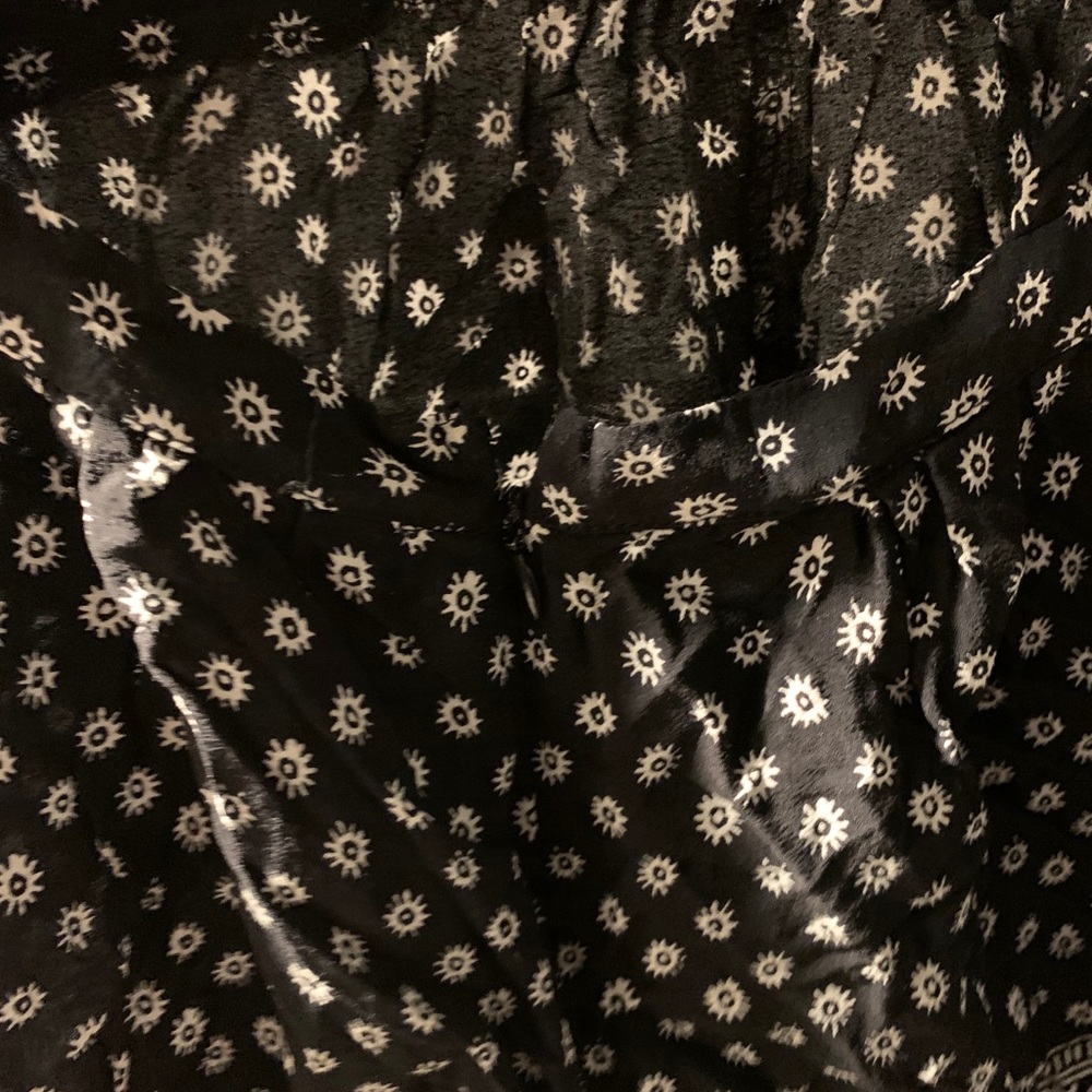 Olivaceous Black and White Halter Floral Patterned Romper - Picture 8 of 9